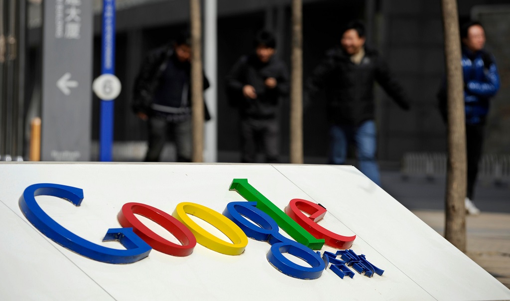 Google dikabarkan akan kembali masuk ke Tiongkok. (AFP PHOTO / LIU JIN)