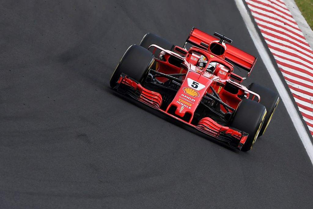 Sebastian Vettel (Foto: AFP PHOTO / ATTILA KISBENEDEK)
