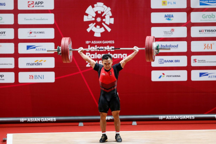 Sabet Emas Perdana di Angkat Besi, Eko Yuli Kalahkan Batas di Asian Games 2018