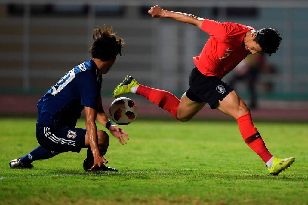 Son Heung-min berhasil membawa Korsel meraih emas cabor sepak bola putra (Foto: CHAIDEER MAHYUDDIN/AFP)