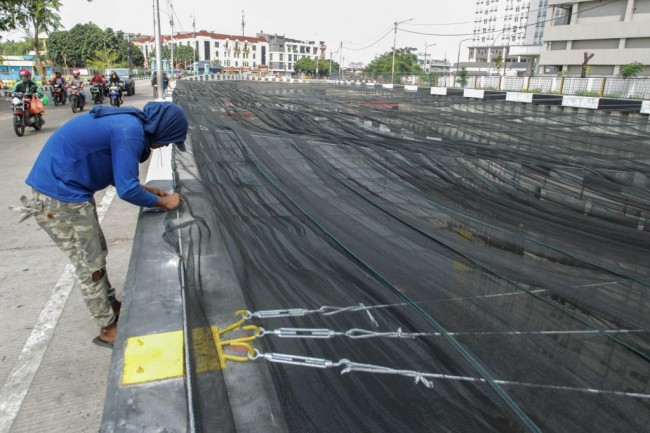Jaring di Kali Item tak akan Dicopot