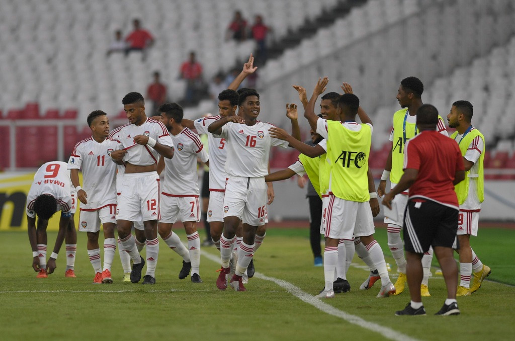 Para pemain UEA merayakan gol ke gawang Qatar pada laga perdana Piala Asia U-19 di Grup A (Foto: ANTARA FOTO/Akbar Nugroho Gumay)