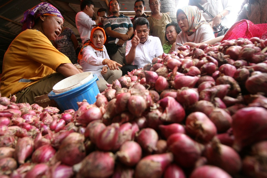 Ilustrasi: Pedagang bawang merah (Foto:Antara/Prasetia Fauzani)