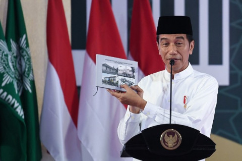 Jokowi Ubah Hadiah Sepeda Jadi Foto