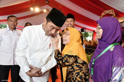Presiden Joko Widodo dan mantan Ketua Umum Pengurus Pusat (PP)