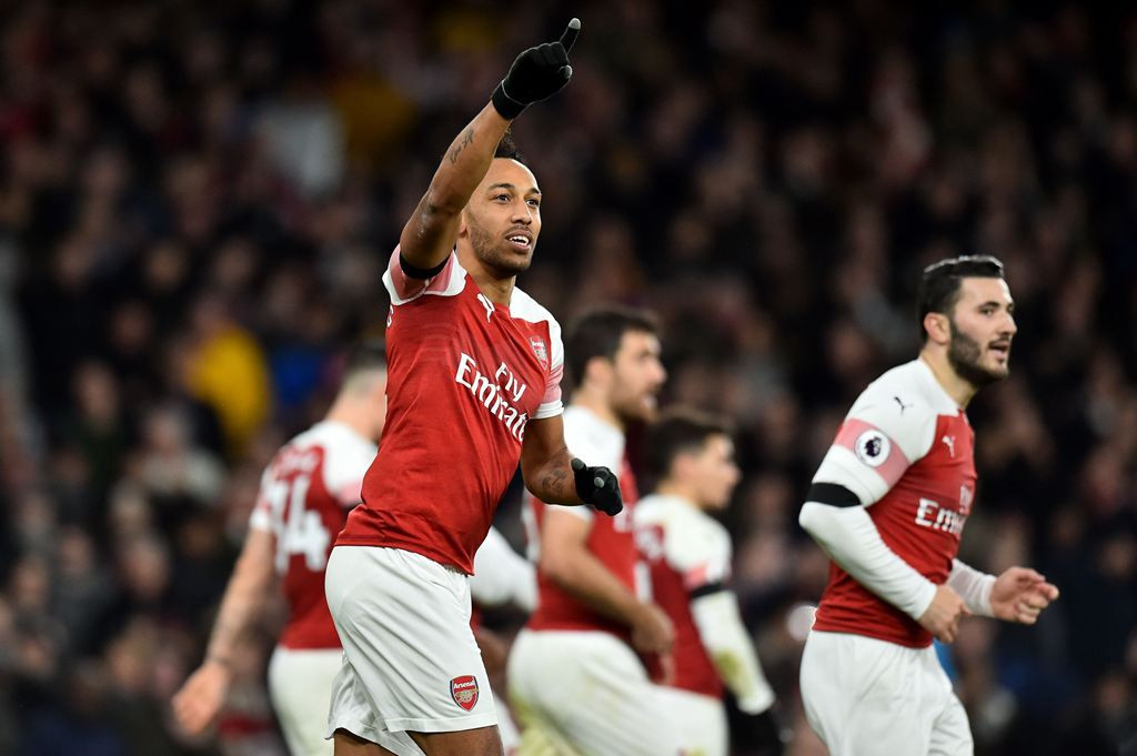 Selebrasi gol striker Arsenal, Pierre Emerick-Aubameyang. (Glyn KIRK / AFP)