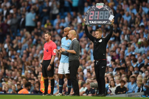 Vincent Kompany dan Pep Guardiola (AFP/OLI SCARFF)