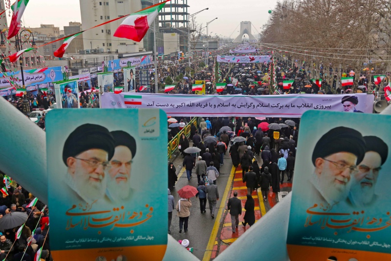 Warga Iran merayakan peringatan 40 tahun Revolusi Iran. (Foto: AFP).