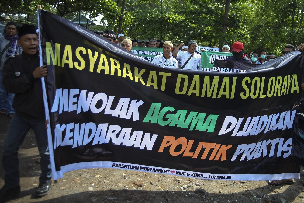 ILUSTRASI: Aliansi Masyarakat Surakarta Cinta Damai menggelar aksi unjuk rasa politisasi agama di Kota Barat, Solo, Jawa Tengah, Jumat (11/1/2019)/ANTARA FOTO/Maulana Surya.