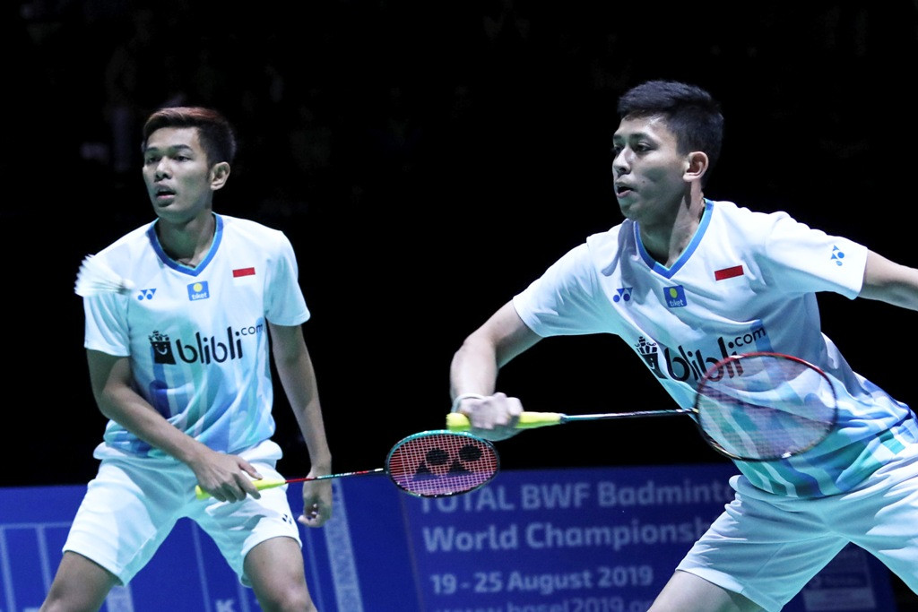 Aksi Fajar Alfian/Muhammad Rian Ardianto saat tampil di Swiss Open 2019. (Foto: Humas PBSI)