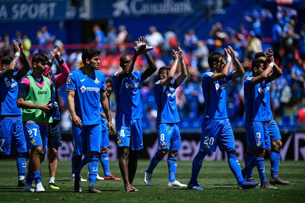 Pemain-pemain Getafe merayakan kemenangan atas Girona (AFP/Oscar Del Pozo)