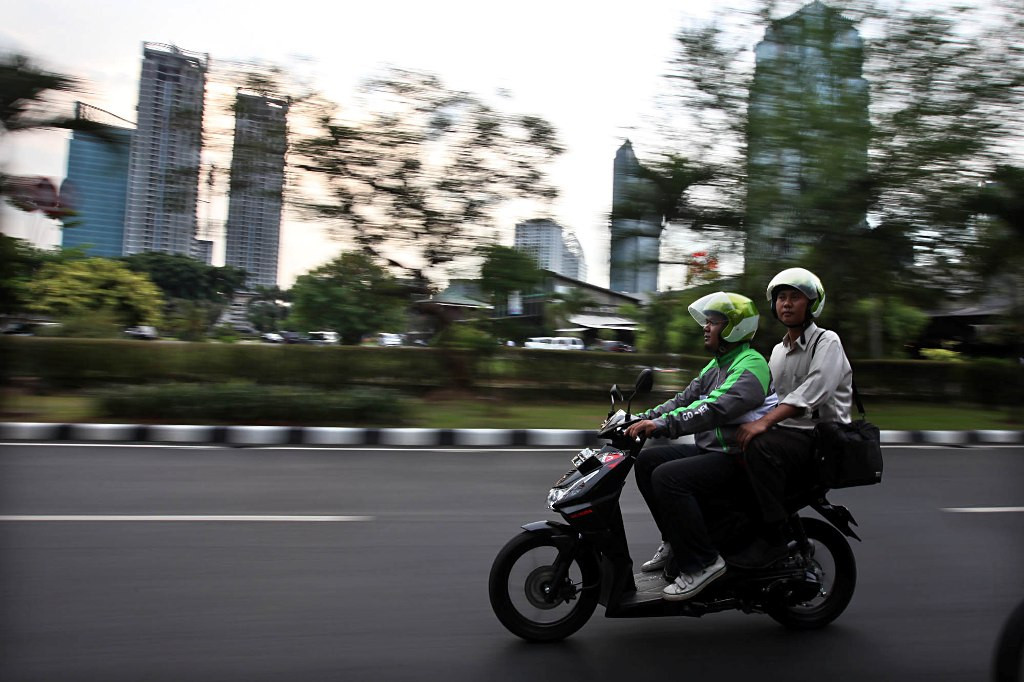 Ilustrasi pengguna Go-Jek. (FOTO: MI/Panca Syurkani)