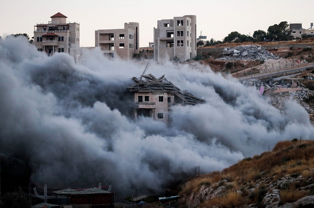 Penghancuran puluhan rumah warga Palestina oleh Israel di Sur Bahir, Yerusalem timur, 22 Juli 2019. (Foto: AFP/AHMAD GHARABLI)