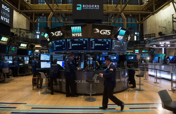 Bursa Saham AS Ditutup Bervariasi Jelang Pidato Powell