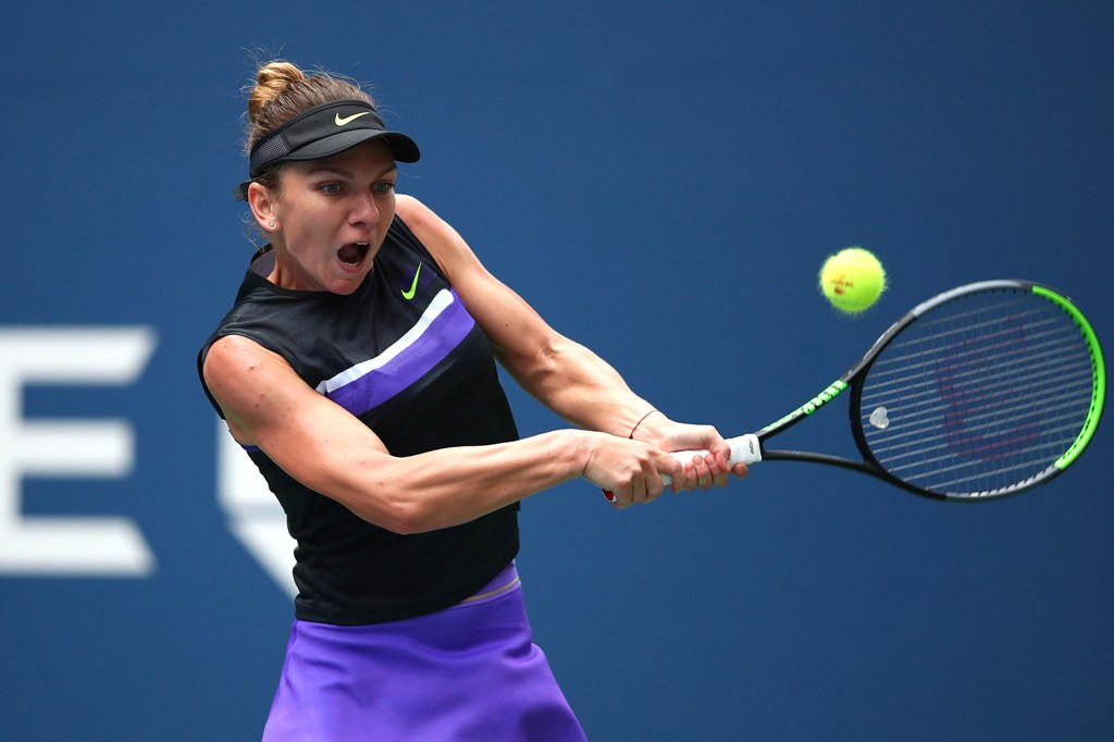 Simona Halep saat tampil menghadapi Nicole Gibbs di babak pertama US Open 2019 (Foto: Clive Brunskill/Getty Images/AFP)
