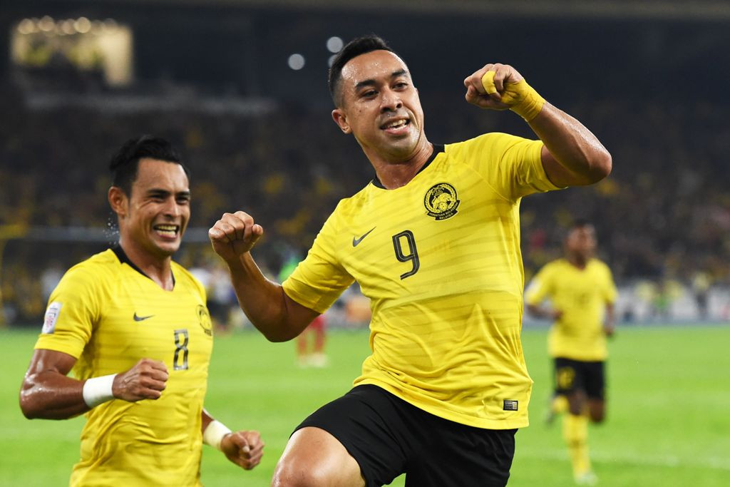 Selebrasi Norshahrul Idlan Talaha usai mencetak gol untuk Malaysia (Foto: MOHD RASFAN / AFP)