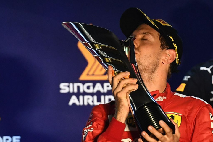 Sebastian Vettel Akhiri Puasa Kemenangan di Singapura