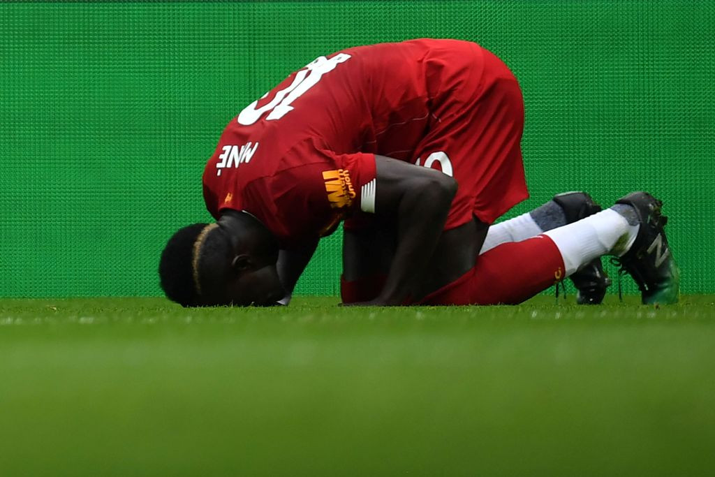 Selebrasi gol Sadio Mane. (Paul ELLIS / AFP)