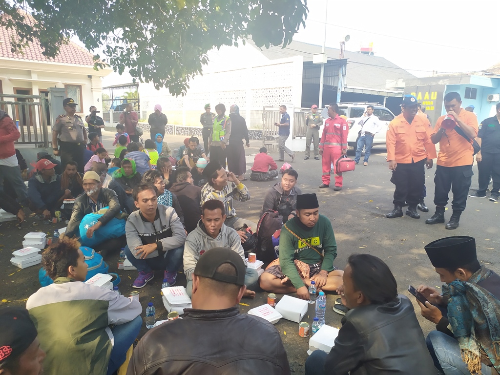 Sejumlah perantau Wamena kembali ke Jawa Timur. (Foto: Medcom.id/Daviq Umar)