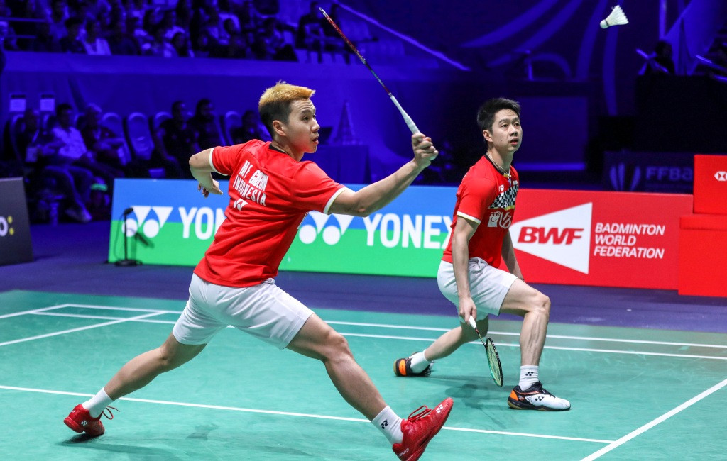 Aksi Marcus Fernaldi Gideon dan Kevin Sanjaya Sukamuljo di French Open 2019 (Foto: Antara/Nafielah - Humas PP PBSI)