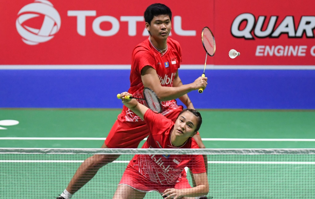 Ganda campuran Indonesia Praveen Jordan (belakang) dan Melati Daeva Oktavianti (depan) tersingkir di babak perempat final China Open 2019 (Foto: Antara/Hafidz Mubarak)