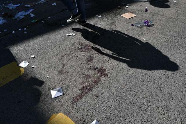 Polisi tembak pedemo di Hong Kong. (Foto: AFP).