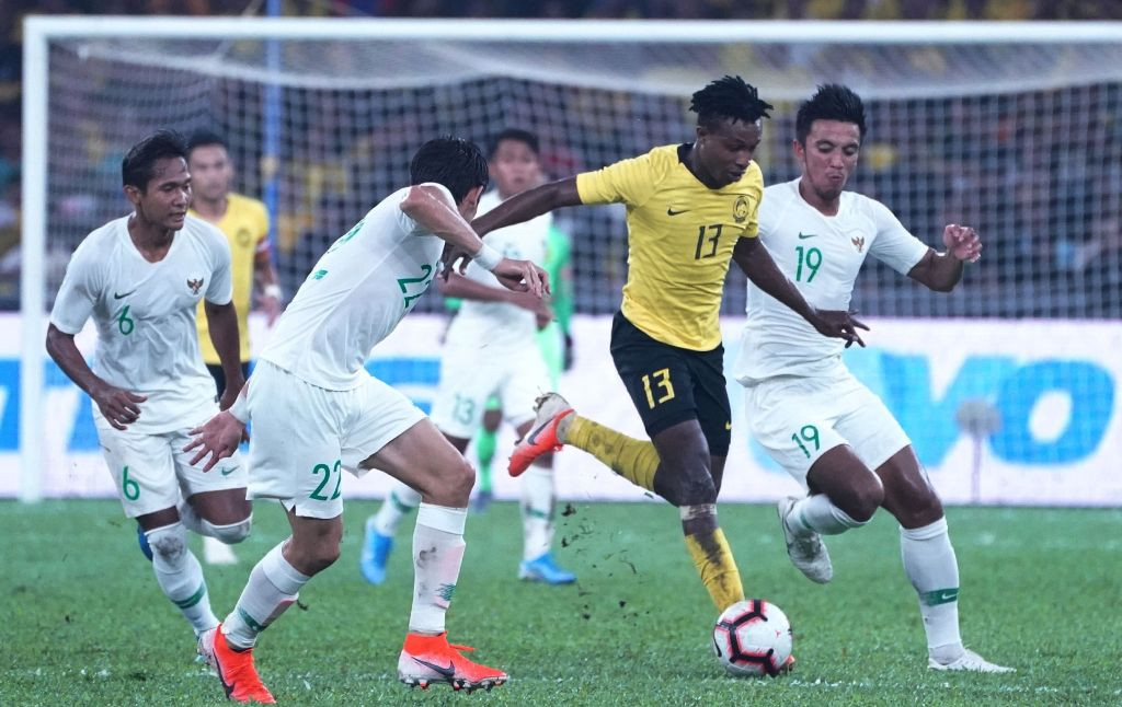 Situasi pertandingan Malaysia vs Indonesia (Foto: AFP/Kamarul Akhir)