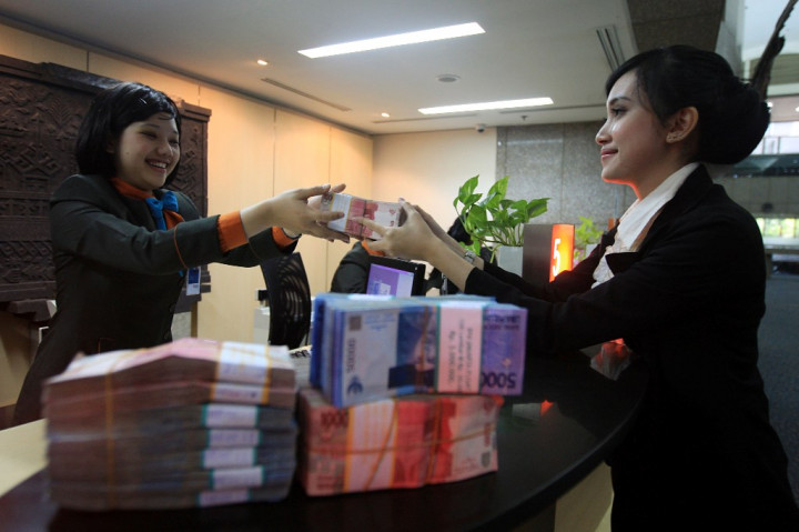 Rupiah ke Level Rp14 Ribu/USD, IHSG Melaju