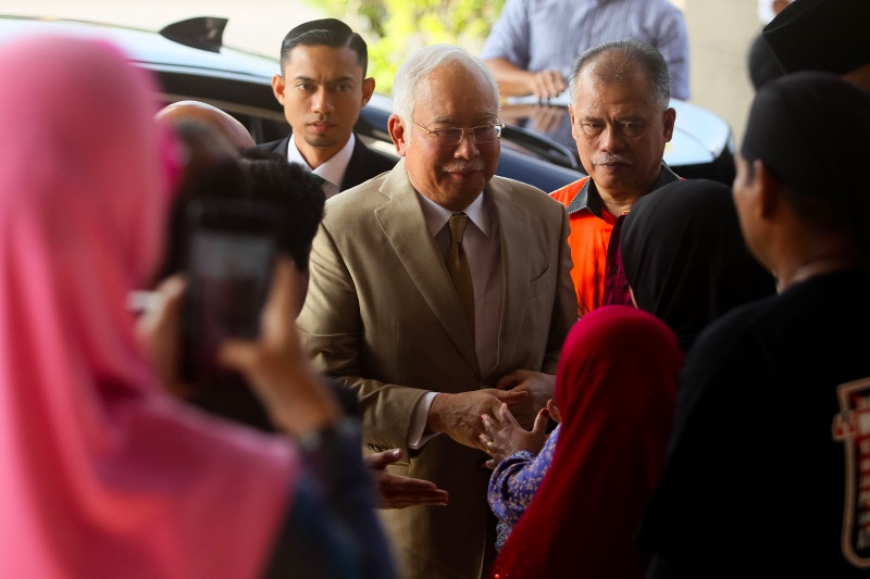 Tuduhan pembunuhan melengkapsi dugaan korupsi yang dihadapi Najib Razak. Foto: AFP
