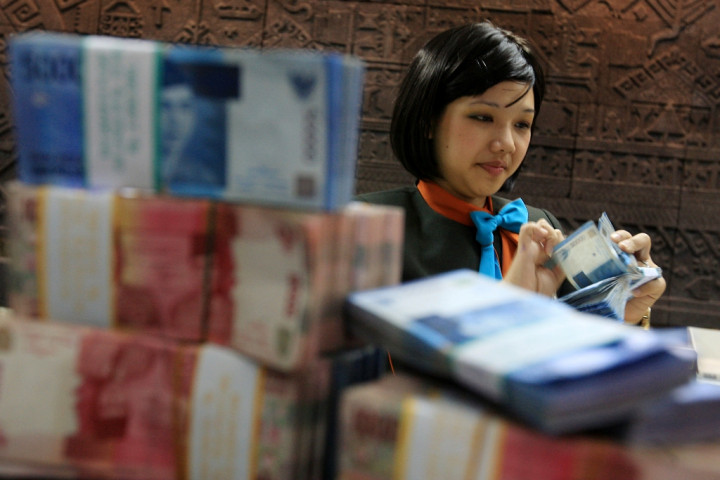 Rupiah Pagi Melemah Tipis ke Rp13.698/USD