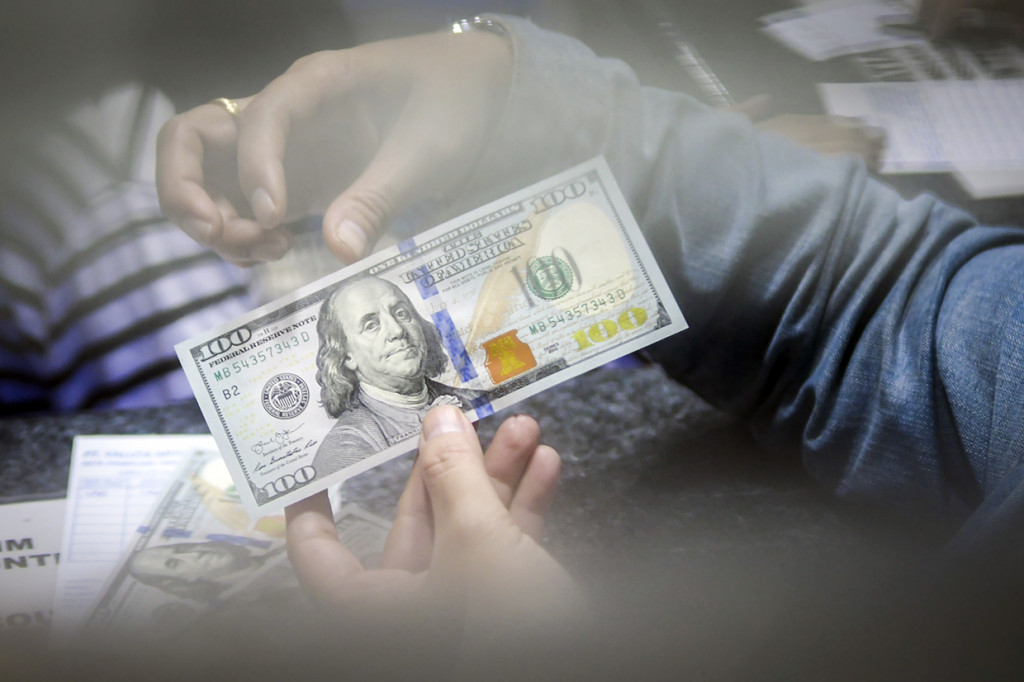 Sentimen Covid-19 Picu Pelemahan Rupiah