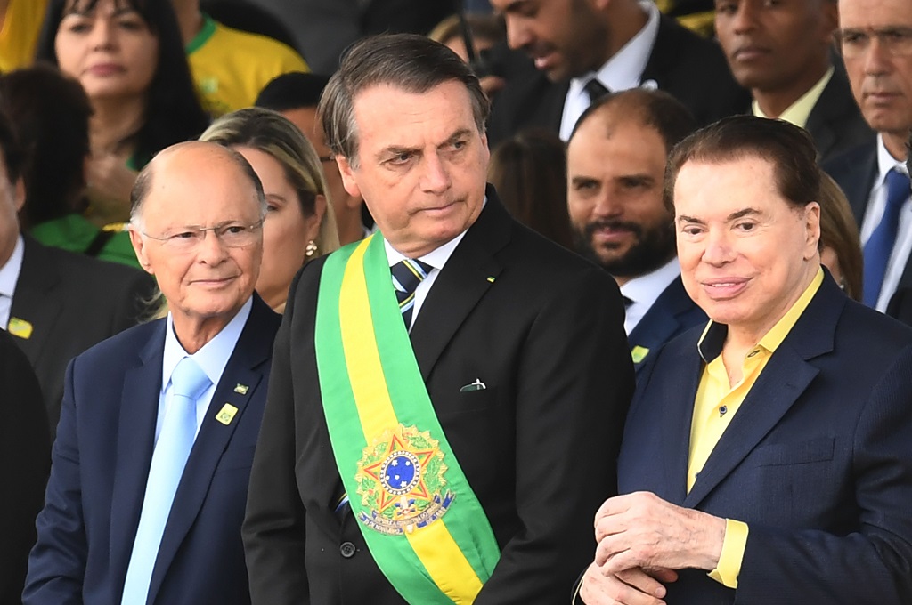 Presiden Brasil Jair Bolsonaro (tengah) dalam sebuah acara di Brasilia. (Foto: AFP)