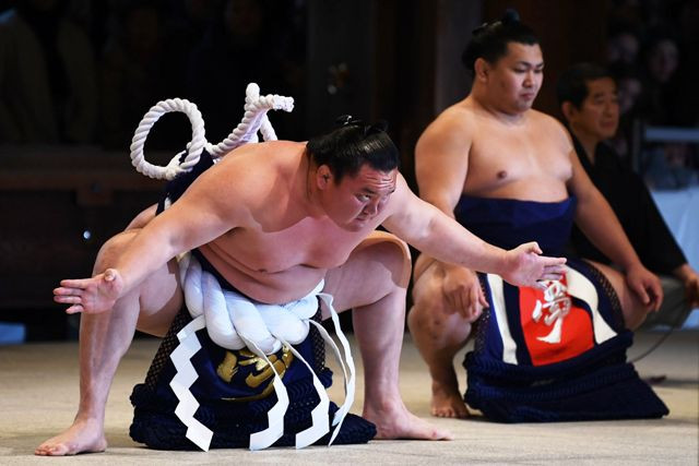 Pesumo Jepang Hakuho of Mongolia: AFP/CHARLY TRIBALLEAU
