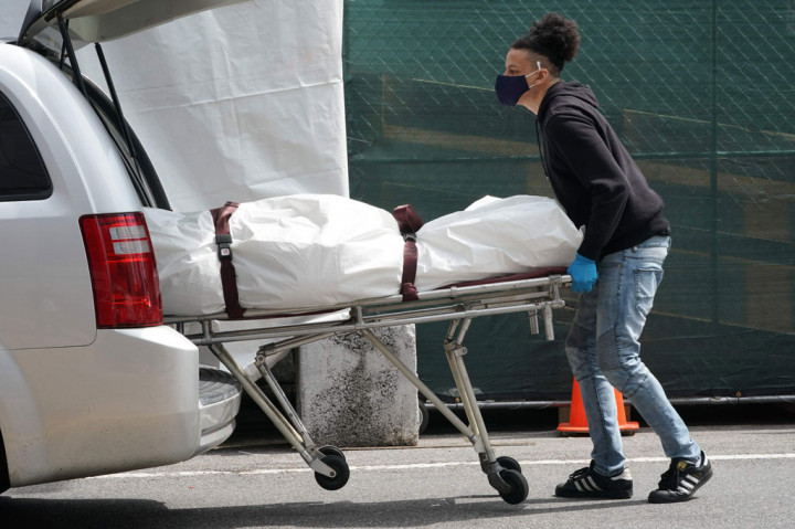 Kematian Akibat Covid-19 di AS Hampir 2 Ribu per Hari