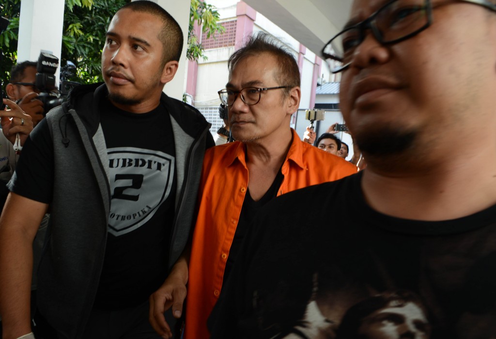 Tio Pakusadewo memakai baju tahanan (Foto: MI)