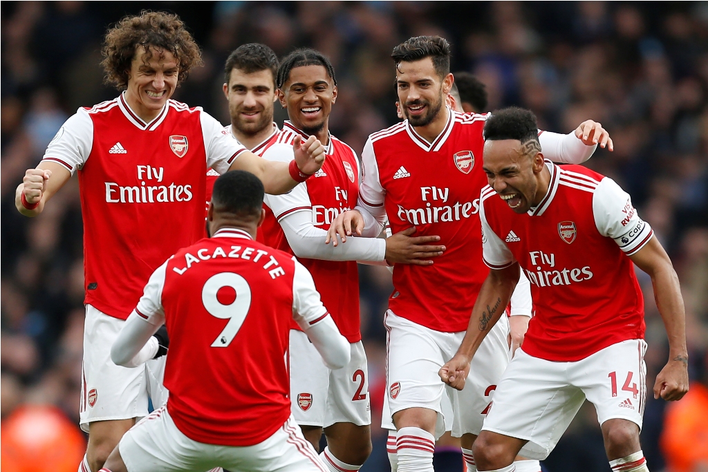 Selebrasi gol para pemain Arsenal. (IAN KINGTON / AFP)