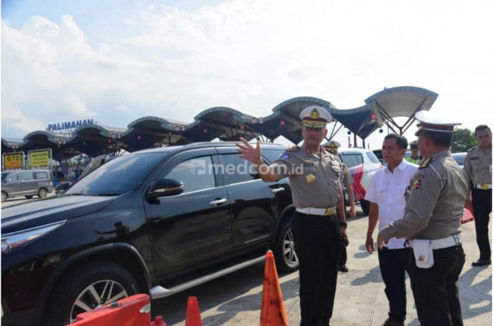 Bau 'Amis' di Pos Pemantauan Mobilisasi Orang