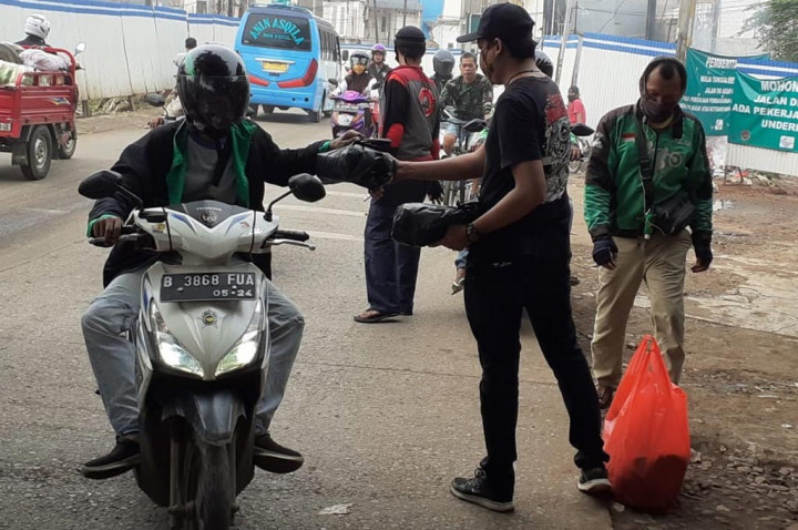 Produsen Pelumas Gandeng Komunitas Motor Gelar Aksi Sosial