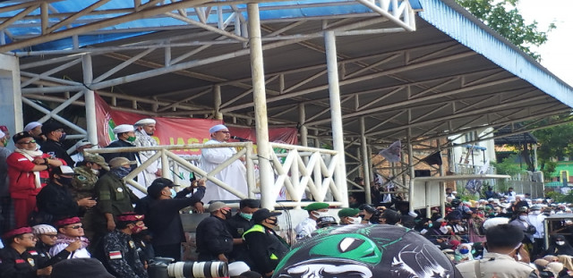 Ketua MUI DKI Jakarta Munahar Muchtar saat memberika sambutan dalam apel siaga Aliansi Nasional Antikomunis di Lapangan Bola Ahmad Yani, Kebayoran Lama, Jakarta Selatan. Medcom.id/Kautsar Widya Prabowo