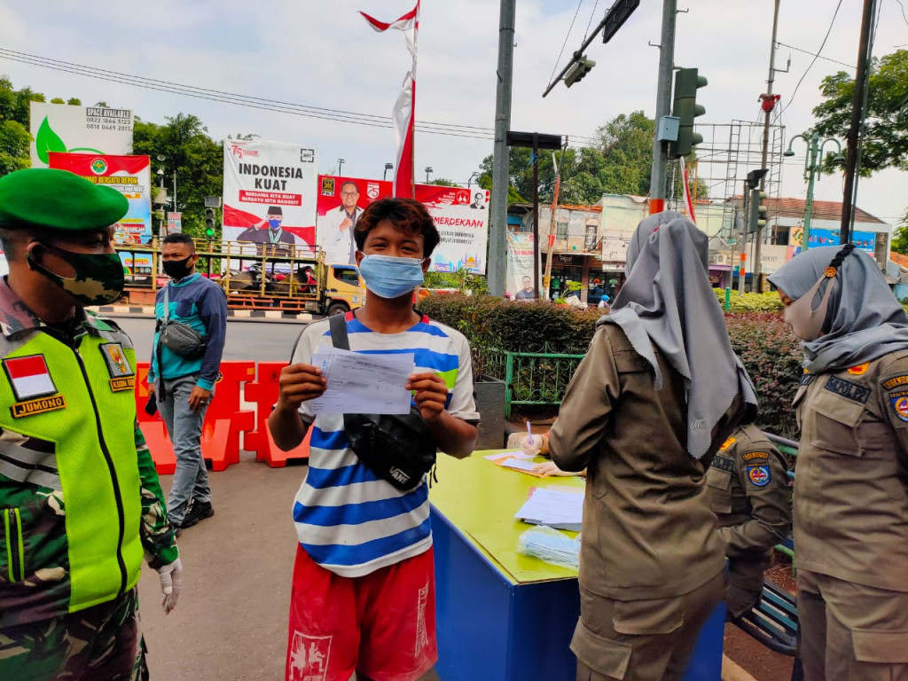 185 Warga Depok  Terjaring Razia Masker Medcom id