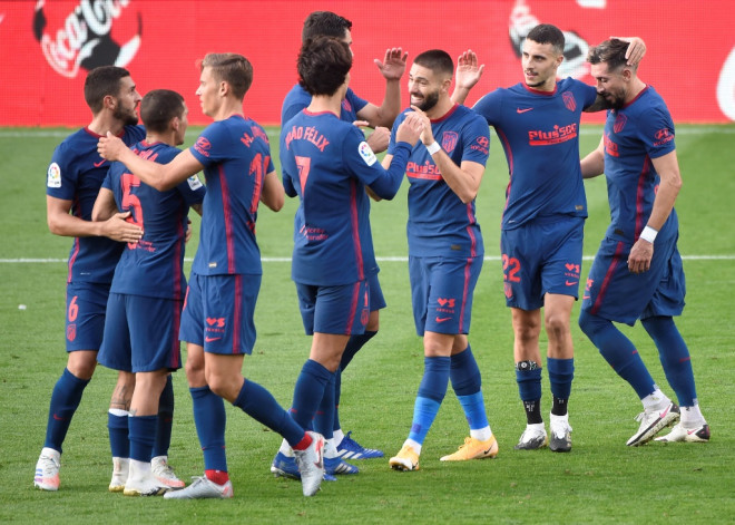 Skuat Atletico Madrid merayakan kemenangan. (Foto: AFP/Miguel Riopa)