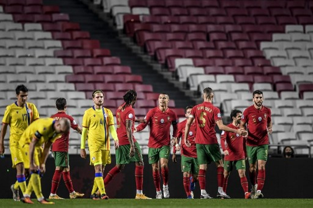 Pemain Portugal merayakan gol kemenangan. (Foto: AFP/Patricia De Melo Moreira)
