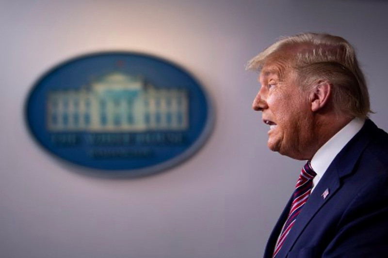 Presiden AS Donald Trump keluarkan perintah eksekutif pendistribusian vaksin covid-19. Foto: AFP