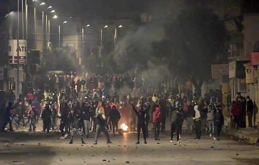 Protes di Tunisia. Foto: AFP.