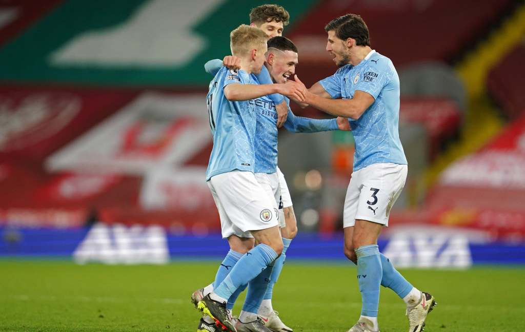 Selebrasi para pemain Manchester City atas gol Phil Foden (tengah) ke gawang Liverpool (Foto: AFP/Jon Super)