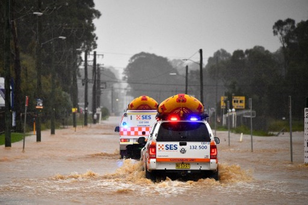 Banjir melanda area permukiman warga di Sydney, Australia pada Sabtu, 20 Maret 2021. (Saeed KHAN / AFP)