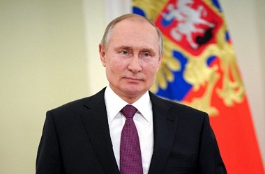 Putin Sebut Rusia Dapat Mencapai <i>Herd Immunity</i> pada Musim Panas
