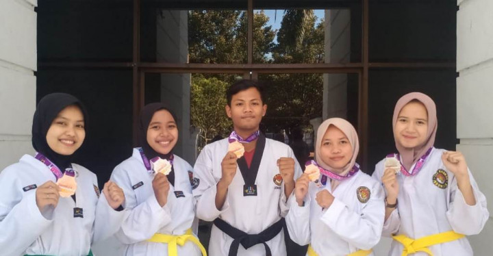 Tim Taekwondo UMM Menorehkan Prestasi Cemerlang di Kejuaraan Internasional