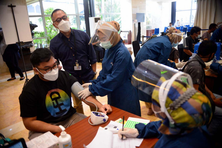 Suasana Hari Kedua Vaksinasi Gotong Royong Media Group