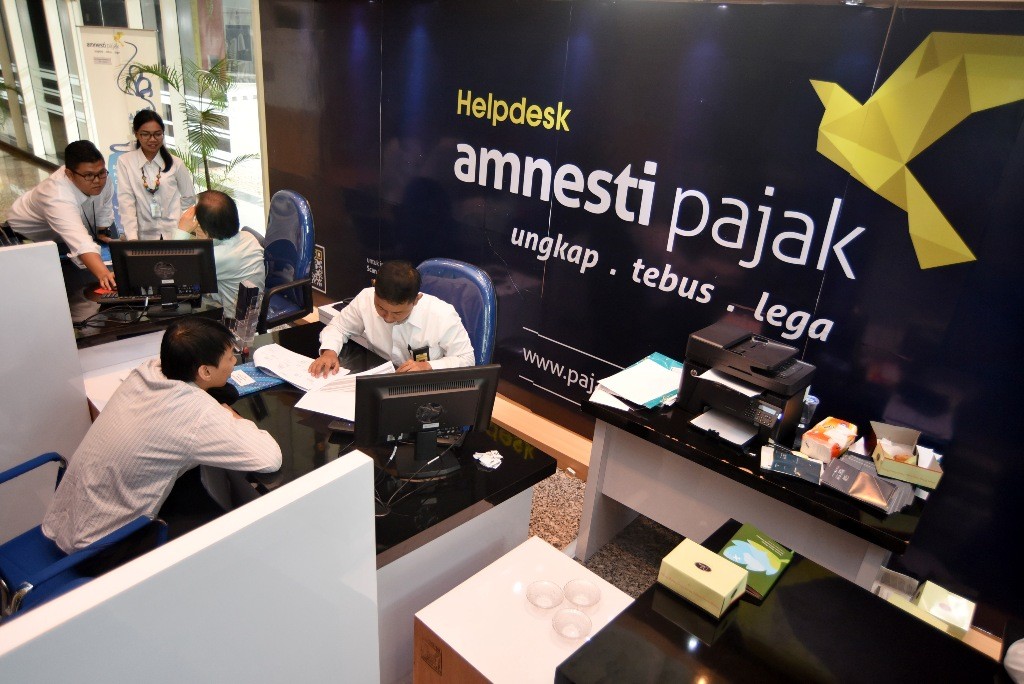 Ilustrasi pusat pelaporan amnesti pajak - - Foto: Antara/ Yudhi Mahatma
